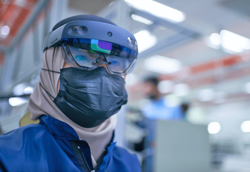 Employee wearing goggles and mask safety gear